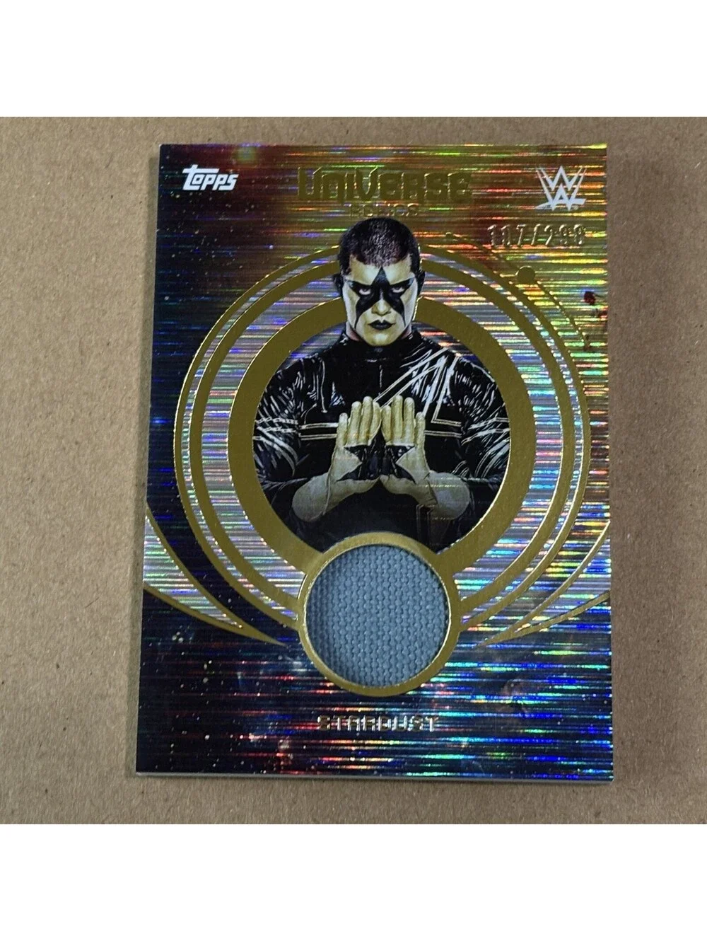 2025 Topps Universe WWE Stardust #UNR-STA Universe Relics #/299 SmackDown
